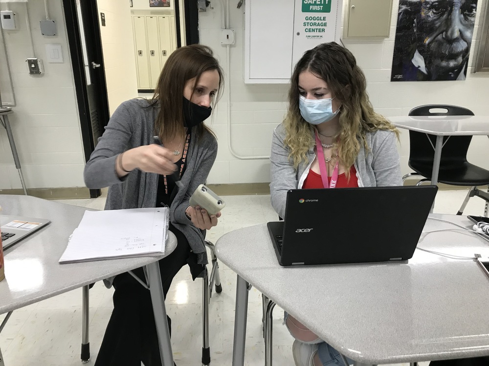 Theresa Lichon works with a student