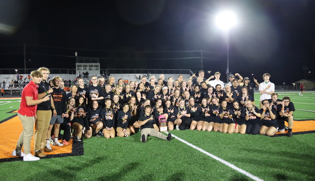 Seniors with the Powder Puff trophy