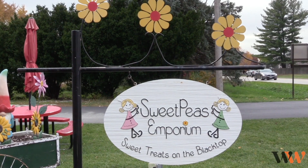 Sweet Peas Emporium sign