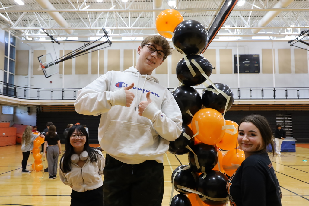 Students with a balloon tower