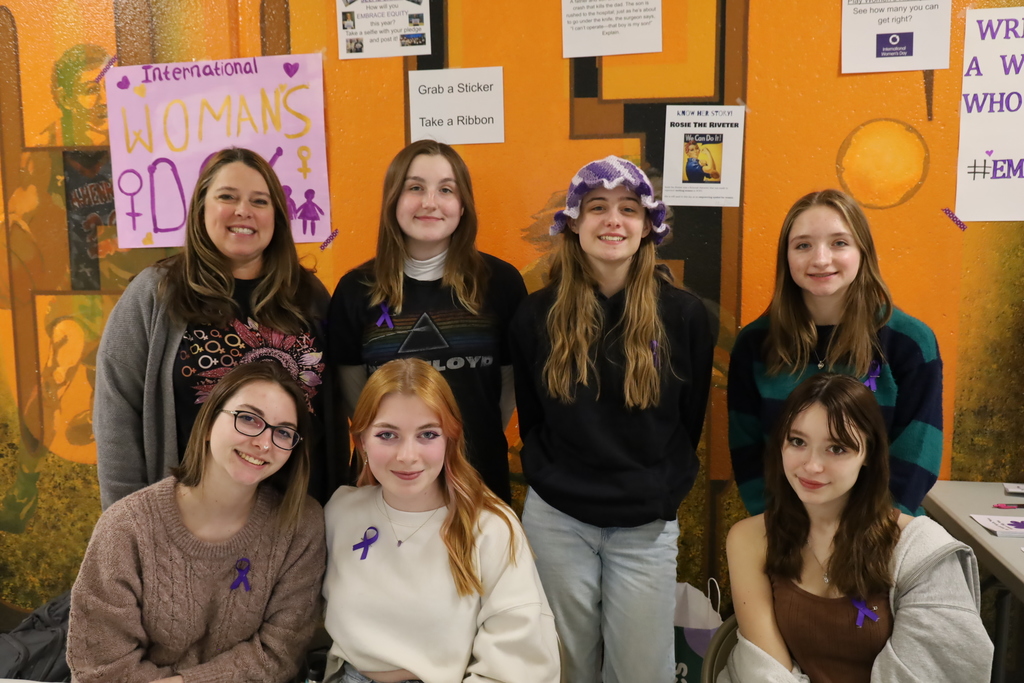 Six girls and Mrs. Rockweiller in the activism club