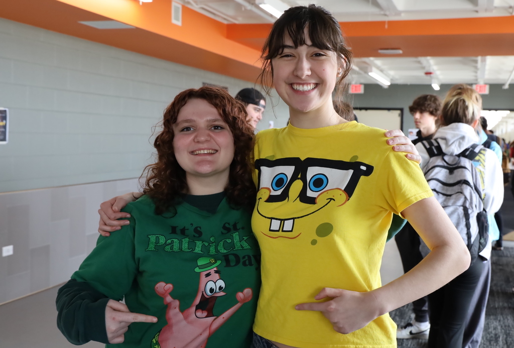 Two students with one Spongebob shirt and one Patrick shirt