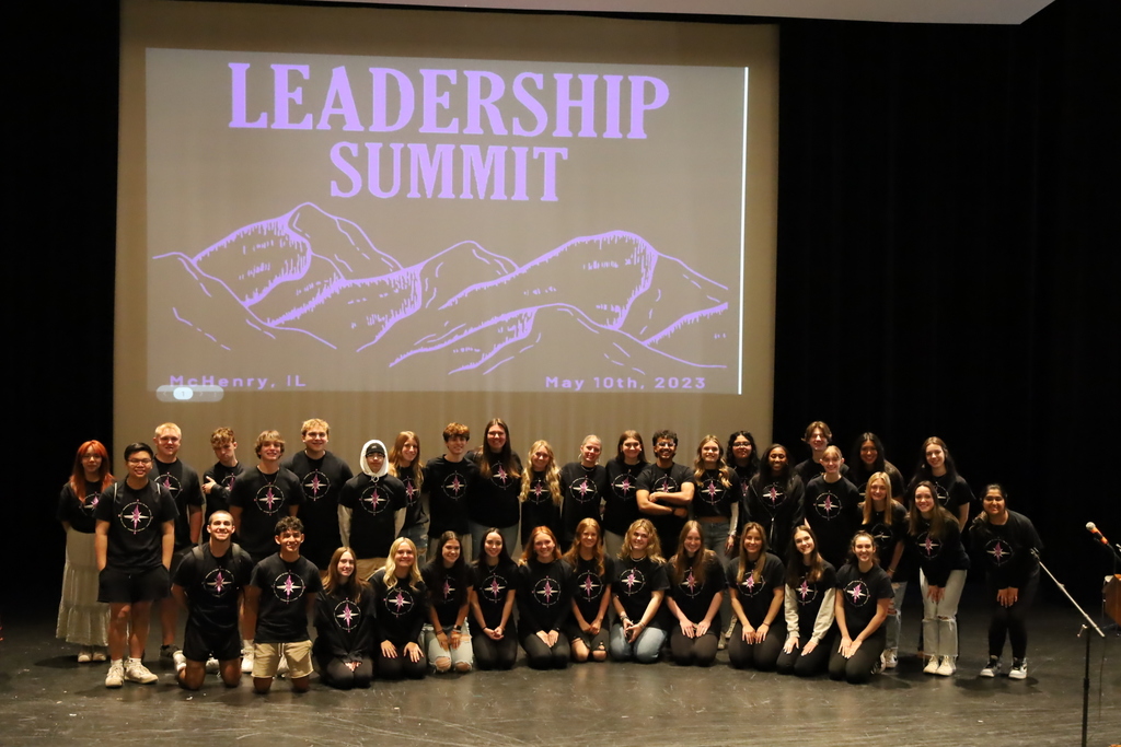 Group of Leadership in Action students with Leadership Summit in the background