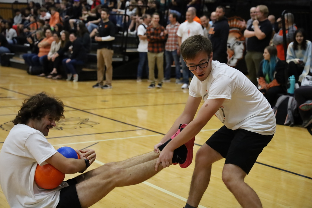 Senior pulling another senior in a game
