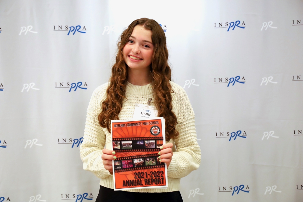 Mollie with the annual report
