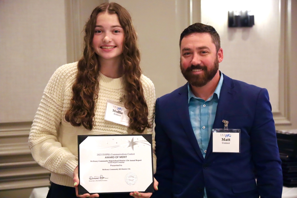 Mollie and Matt Connor with the award