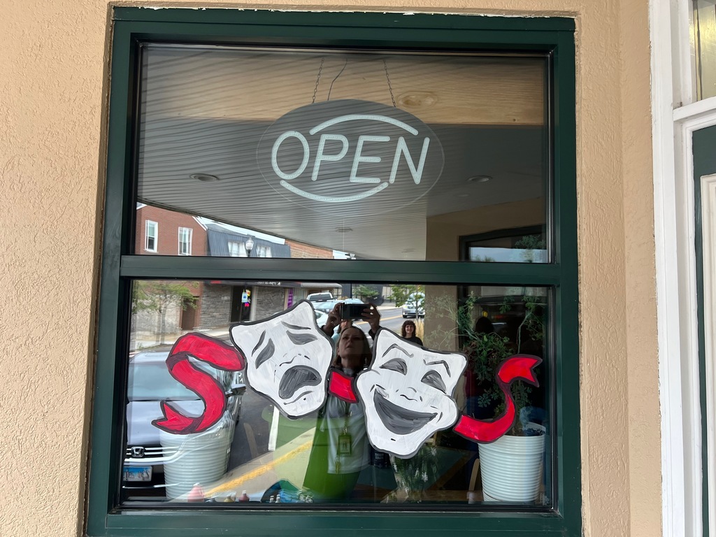 Drama icon painted on the window