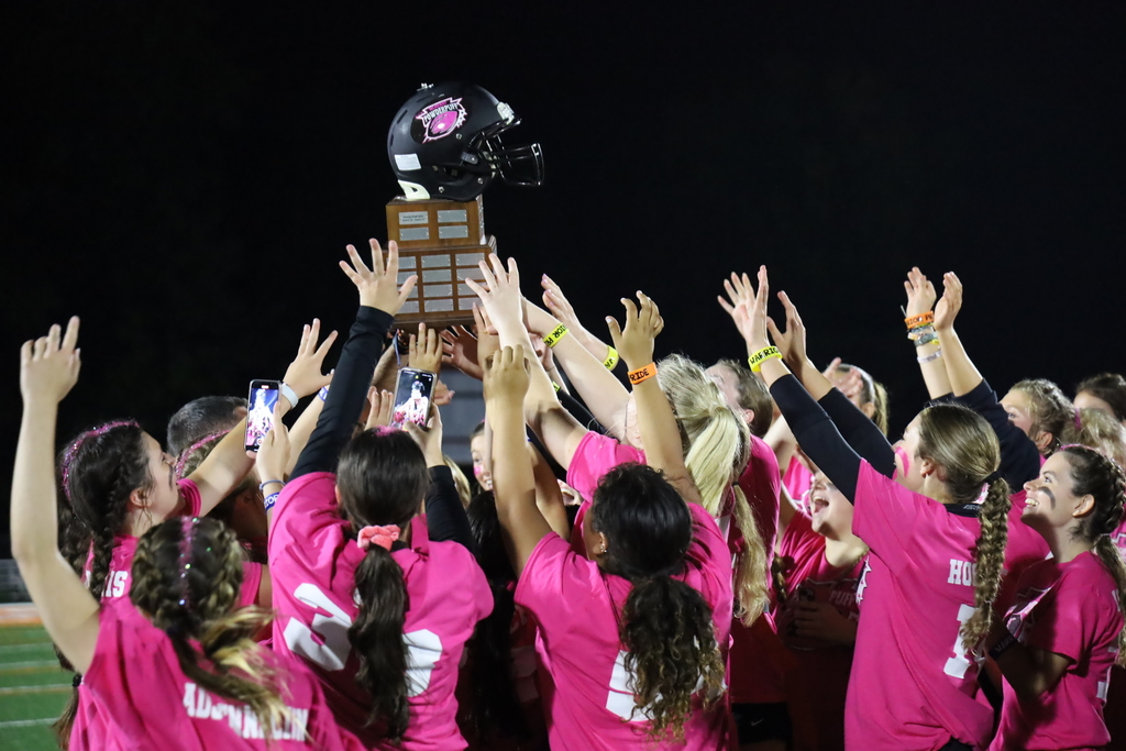 Seniors grabbing at the trophy